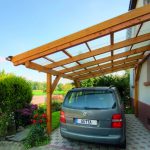 Carport with acrylic corrugated sheets clear