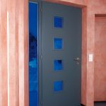 Door with acrylic glass colored blue